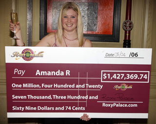 Amanda R. with her $1.4 Million paycheck from Roxy Palace Casino!